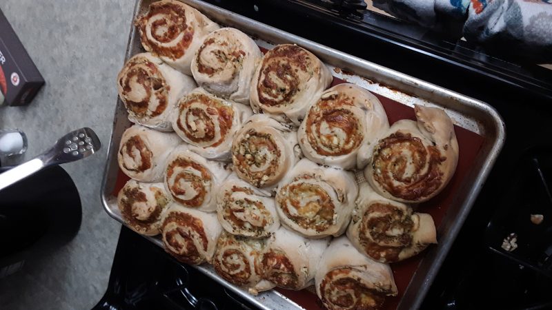 a sheet pan of freshly baked rolls