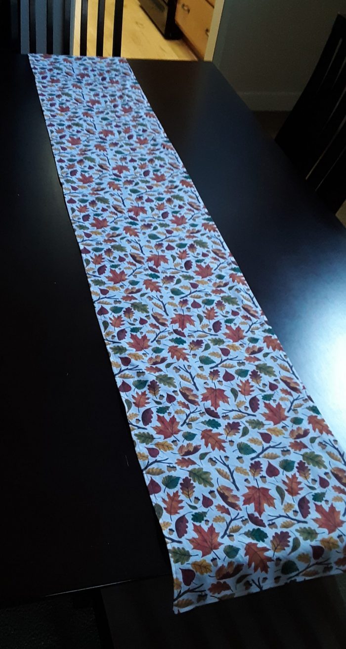 a fall-themed table runner