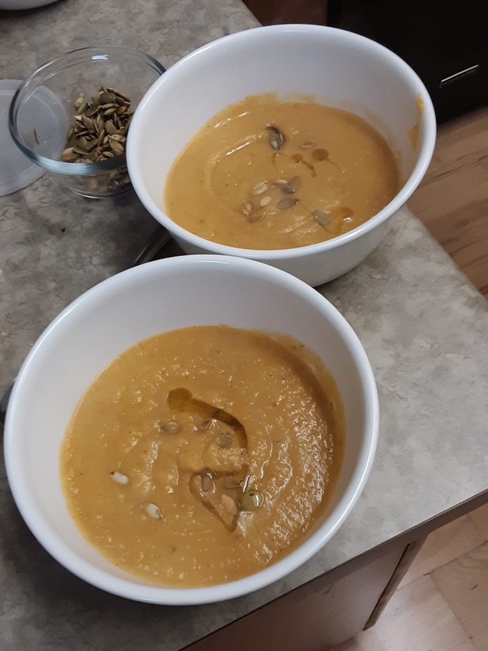 two bowls of butternut squash soup