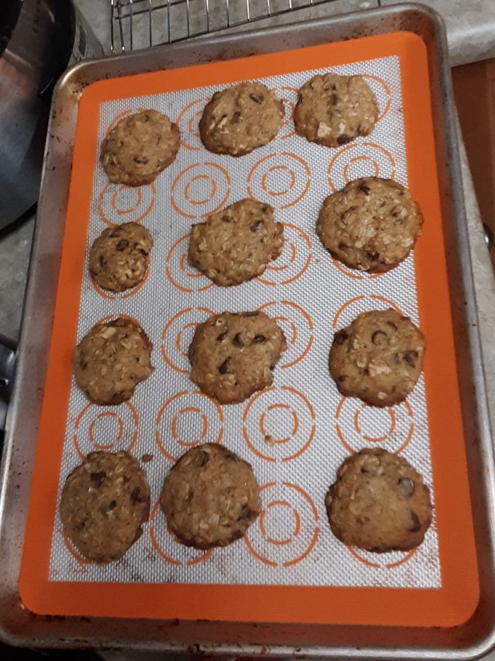 12 oatmeal cookies on a sheet pan