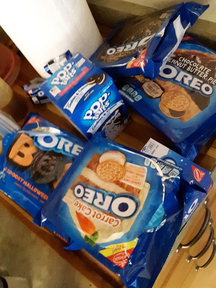 about 6 packages of oreos of varying flavors