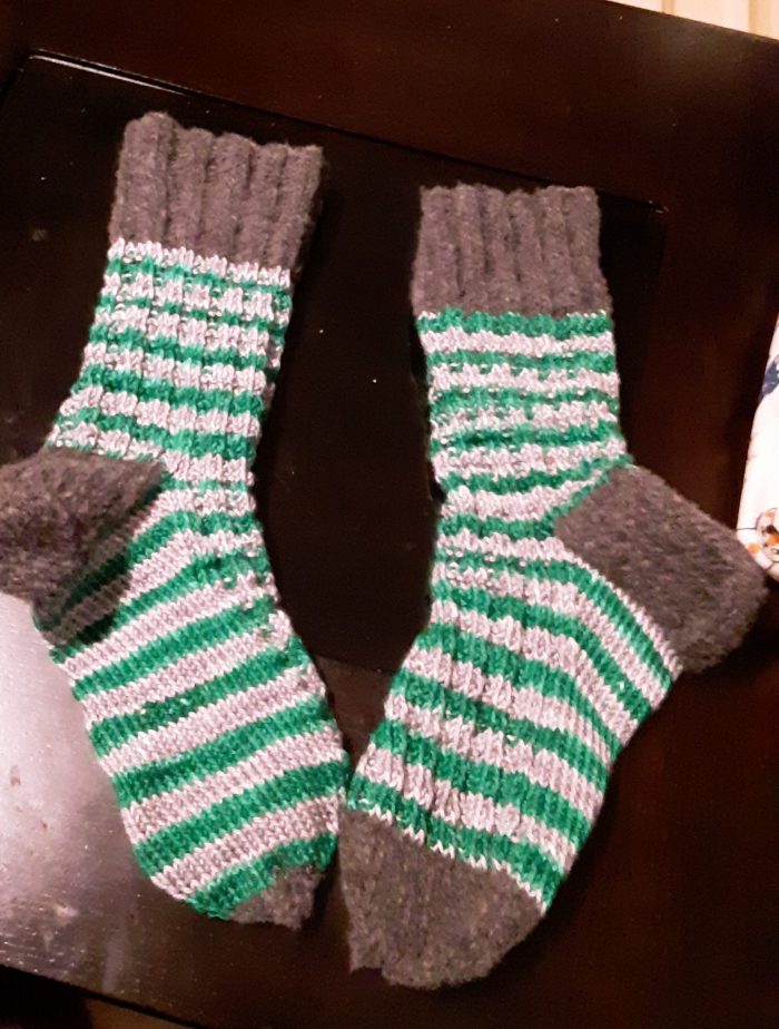 textured socks in green and silver stripe with grey heel, cuff, and toe