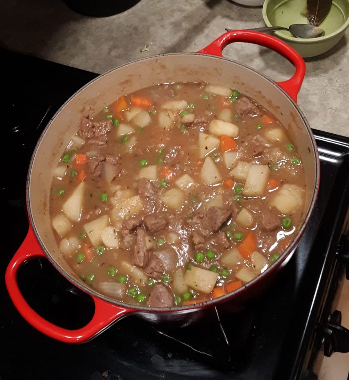 a large pot full of beef stew