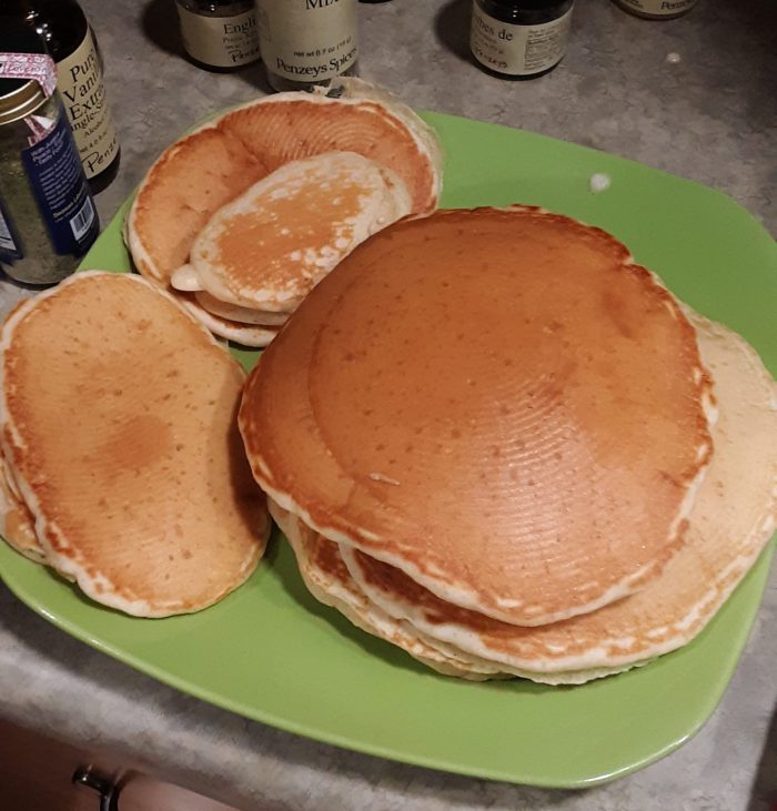 a stack of sourdough pancakes on a plate