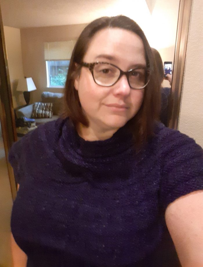 me wearing my freshly knit shirt
