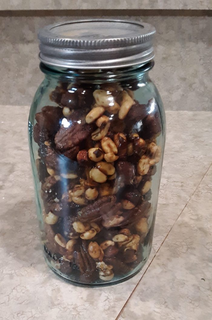 a mason jar of mixed nuts