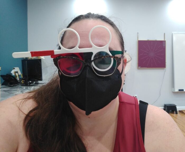 me, looking like a cyborg or something. I'm wearing a face mask and glasses. I have a red/green 3D lenses on plus a "flipper" set of lenses that chances the magnification. It's too much for one face.