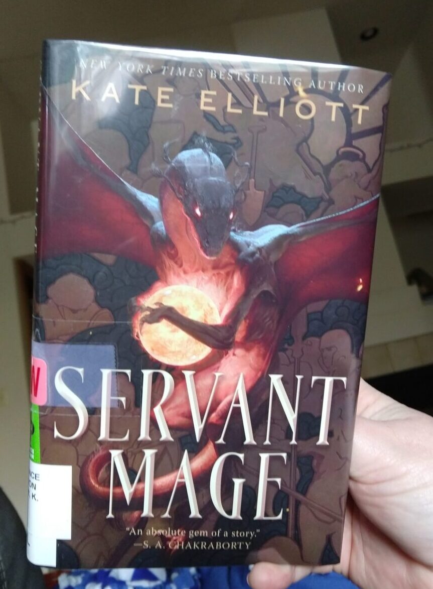 hardcover book: Servant Mage by Kate Elliott. The cover features a dragon hugging some kind of orb of light
