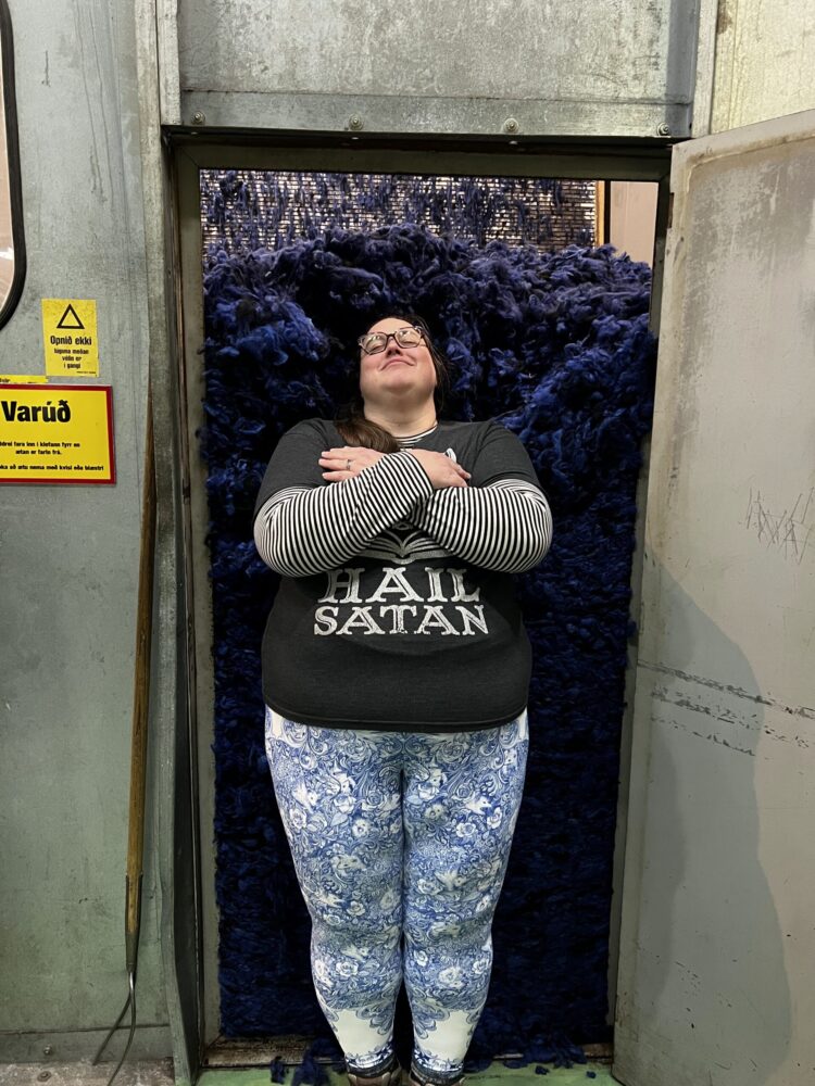 me pretending I'm resting in a coffin of fresly washed and dyed sheep fur that is about to be turned into yarn. I'm trying to look serious but it's not working