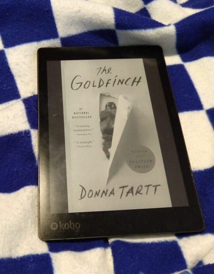 cover of The Goldfinch by Donna Tartt shown in greyscale on Kobo ereader