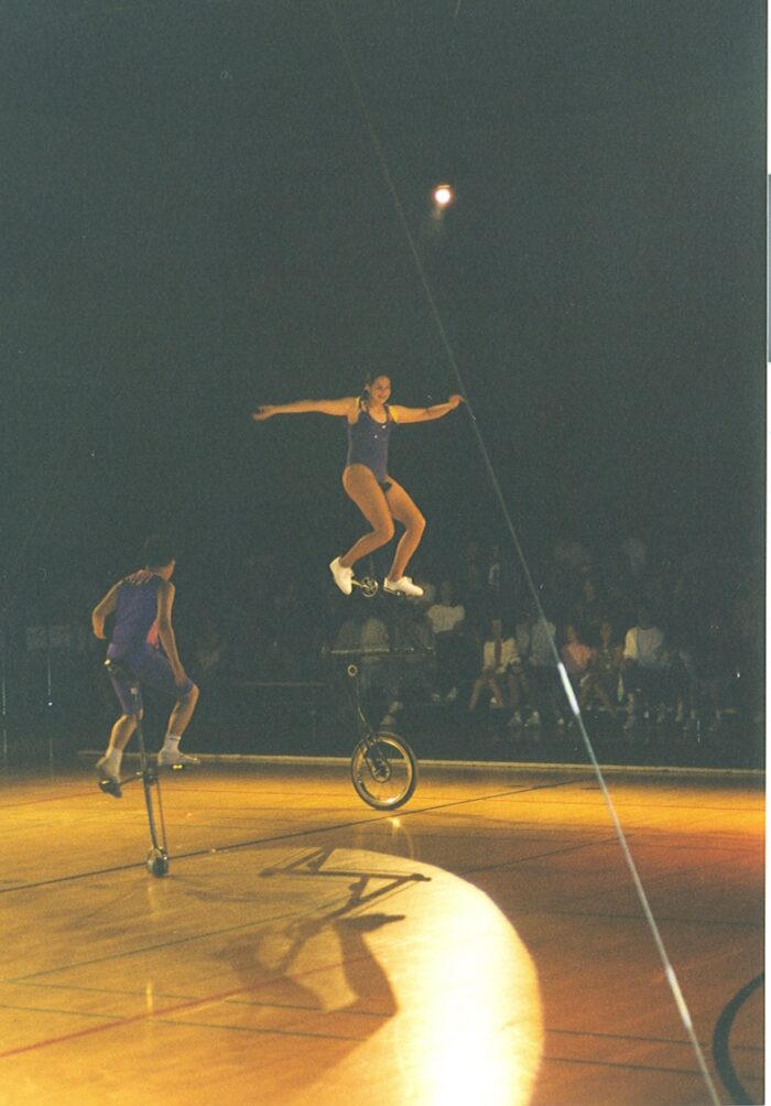 Me riding an 8-foot tall unicycle that has a frame shaped like a Z