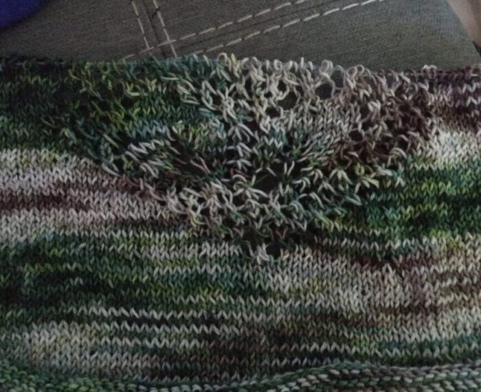 a bit of knitting showing the pattern emerging of the Marsh tee