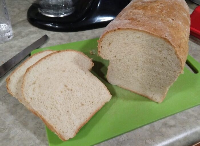 A loaf of bread that has oats incorporated into the dough. Shown here in cross section