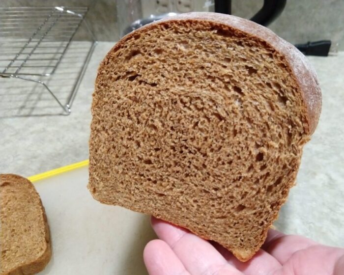 cross section of a loaf of whole wheat bread revealing a nice, even crumb
