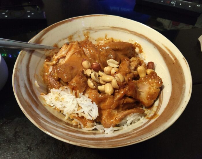 a bowl of rice and slow-cooker peanut butter chicken