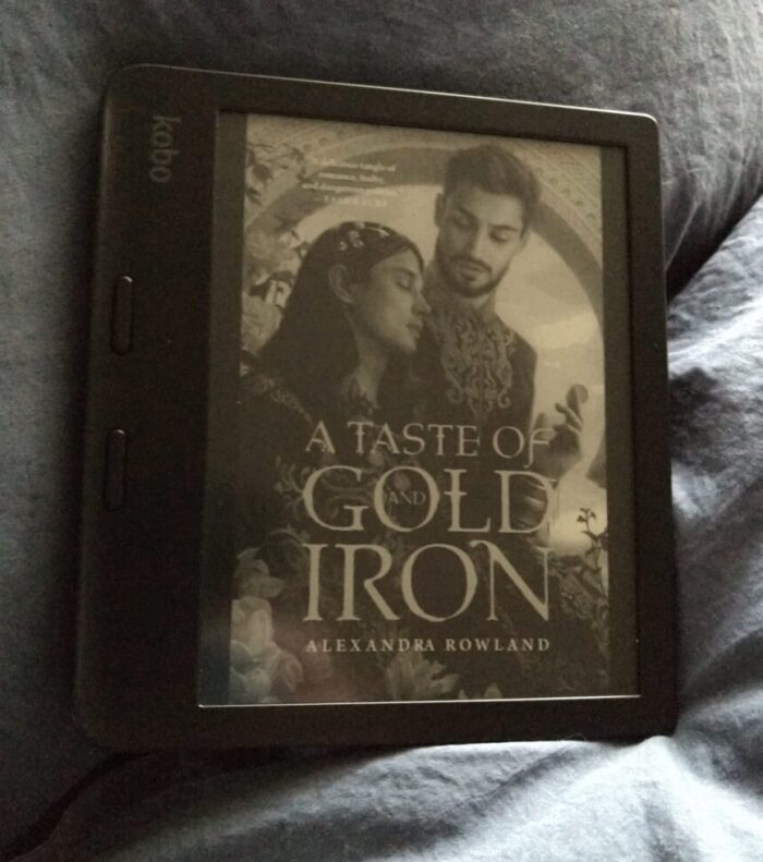 cover for the book A Taste of Gold and Iron shown on Kobo ereader