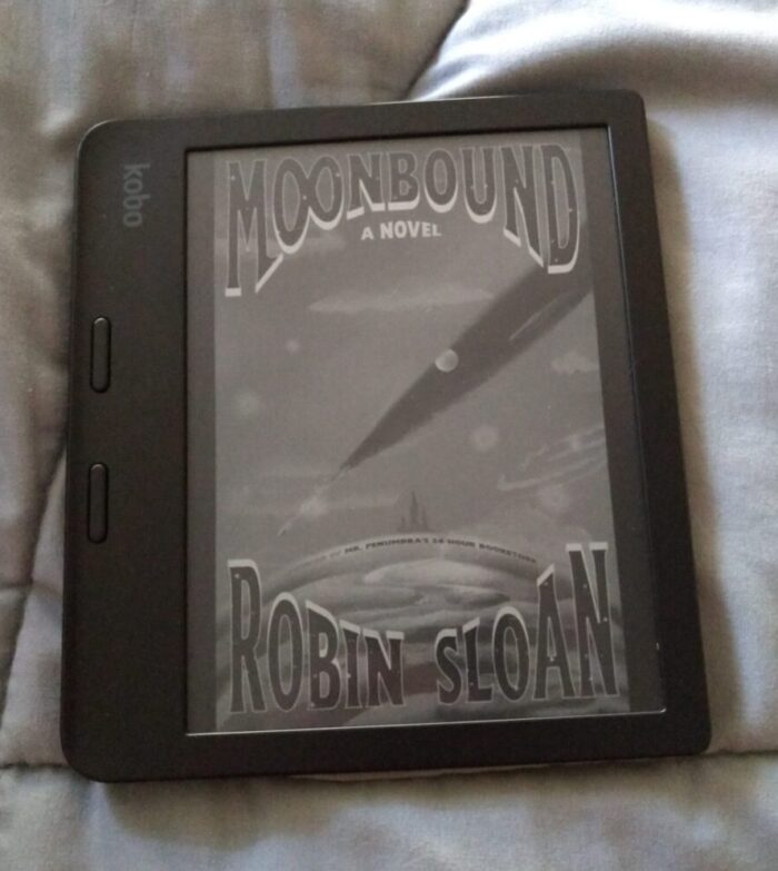 cover for Moonbound shown in greyscale on kobo ereader