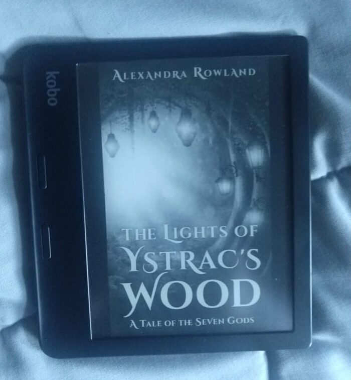 Cover for The Lights of Ystrac's Wood shown in greyscale on Kobo ereader