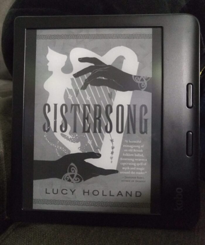 book cover for Sistersong shown in greyscale on kobo ereader