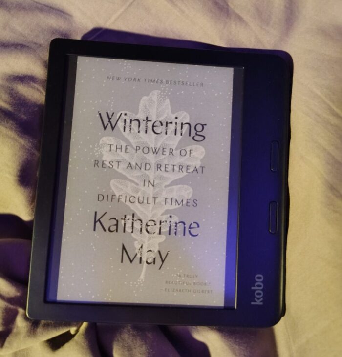 book cover of Wintering: The Power of Rest and Retreat in Difficult Times shown on kobo ereader