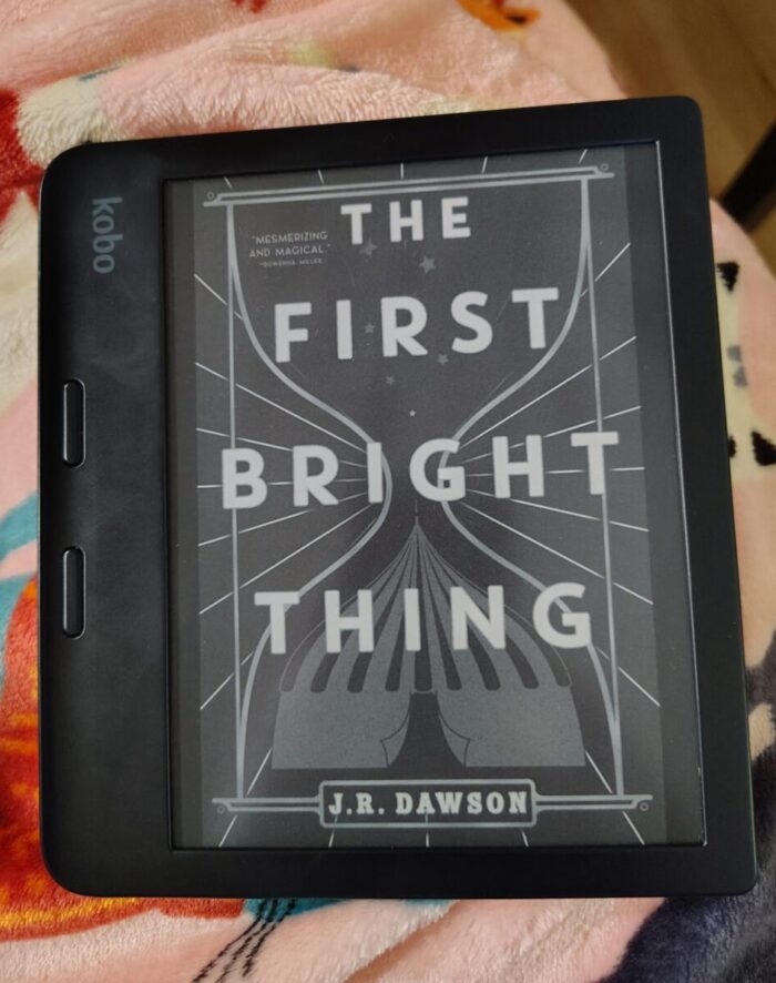 cover for the book The First Bright Thing shown on kobo ereader