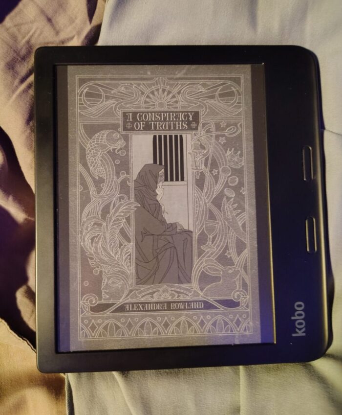 book cover for A Conspiracy of Truths in greyscale on kobo ereader