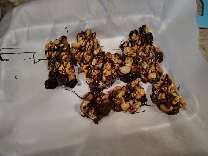 a batch of nut-based granola bars with most of them not really being successful bars at all but we tried