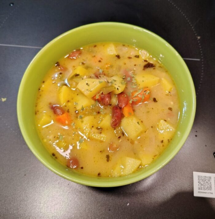a bowl of soup! Beans, chunks of potato and carrot, topped with herbs