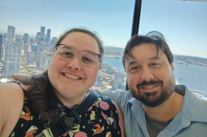 Kirk and I at the top of the space needle, with a view of Seattle in the background