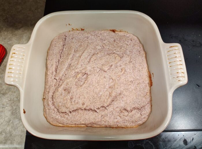 a pan of freshly baked cornbread. It's purple (ish)!