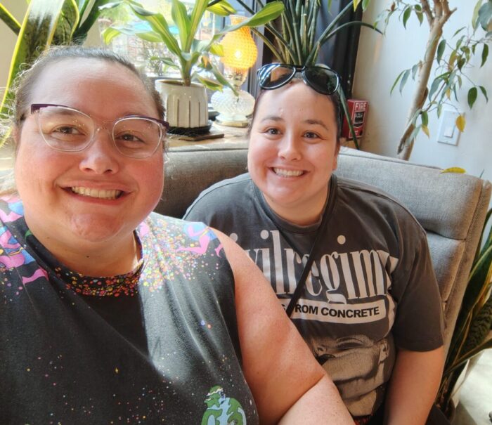 My sister and I smiling at the camera