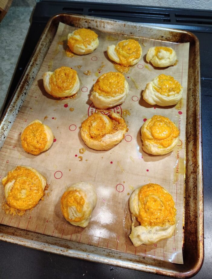 puff pastry rolled up with cheese and baked